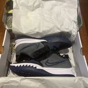 New in box Nike Kyrie 4 Low TB, Size 11.5 in Black/White-Midnight Navy.